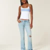 Lågmidjade, slitna, ljusblå bootcut-jeans med broderier