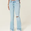 Lågmidjade, slitna, ljusblå bootcut-jeans med broderier
