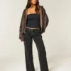 Lågmidjade, tvättade svarta baggyjeans Lågmidjade, tvättade svarta baggyjeans