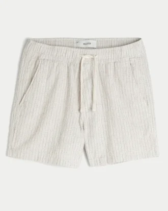 Linnenblandade seersuckershorts i midilängd