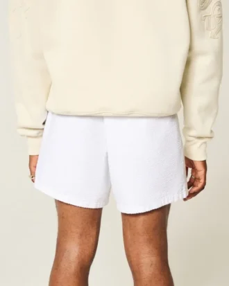 Linnenblandade seersuckershorts i midilängd