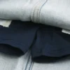 Ljus tvättad miniskort i denim med snörning