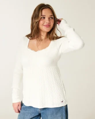 Långärmad babydoll med fyrkantig halsringning Långärmad babydoll med fyrkantig halsringning