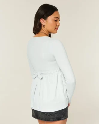 Långärmad babydoll-top med grafiskt tryck och pinch bust