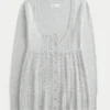 Långärmad babydoll-tröja med fyrkantig halsringning Långärmad babydoll-tröja med fyrkantig halsringning
