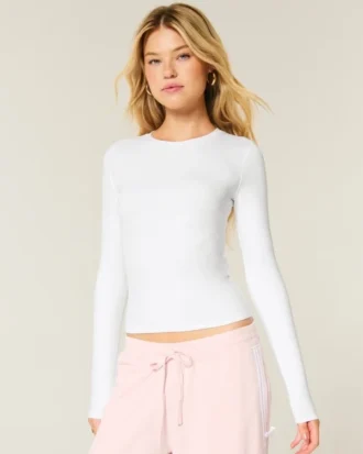 Långärmad sömlös baby-T-shirt i stretchig trikå