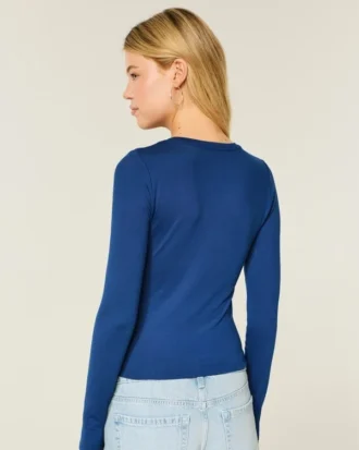 Långärmad sömlös baby-T-shirt i stretchig trikå