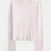 Långärmad sömlös baby-T-shirt i stretchig trikå