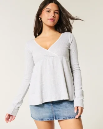 Lätt långärmad babydoll-top i pointelle