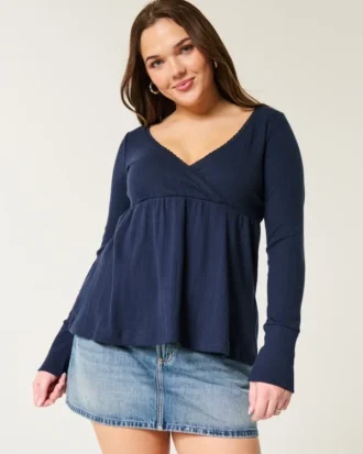 Lätt långärmad babydoll-top i pointelle