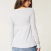 Lätt långärmad babydoll-top i pointelle