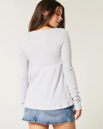 Lätt långärmad babydoll-top i pointelle