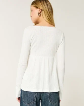 Lätt långärmad babydoll-top i pointelle