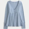 Lätt långärmad babydoll-top i pointelle