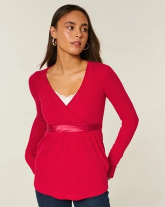 Lätt långärmad babydoll-tröja med omlottfront