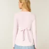 Lätt långärmad babydoll-tröja med omlottfront Lätt långärmad babydoll-tröja med omlottfront