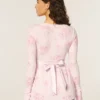 Lätt långärmad babydoll-tröja med omlottfront Lätt långärmad babydoll-tröja med omlottfront