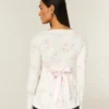 Lätt långärmad babydoll-tröja med omlottfront