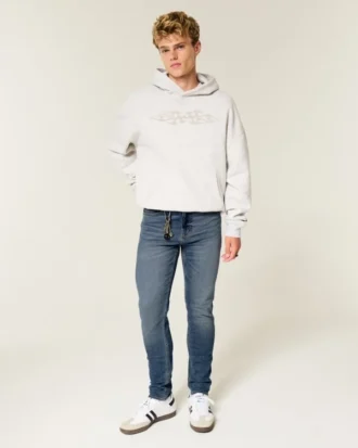 Mediumtvättade atletiska skinny jeans