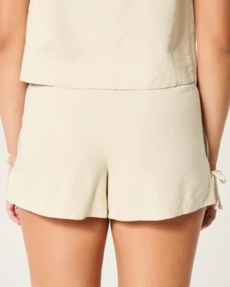 Mjuk shorts i linneblandning med rosett på sidan