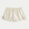 Mjuk shorts i linneblandning med rosett på sidan