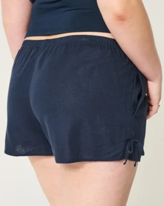 Mjuka shorts i linneblandning med rosett på sidan