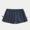 Mjuka shorts i linneblandning med rosett på sidan