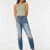 Mom-jeans med extra hög midja, slitningar och medium tvätt