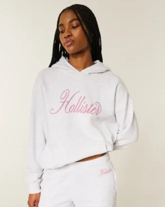 Oversized hoodie med glittrande logotyp