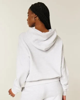 Oversized hoodie med glittrande logotyp