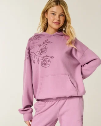 Oversized hoodie med glittrande logotyp