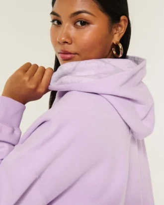 Oversized hoodie med kamouflagefoder