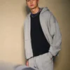 Rektangulär passform Hoodie med dragkedja och nitar
