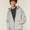 Rektangulär passform Hoodie med dragkedja och nitar