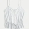Spetsdetaljerad peplum-top