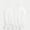 Spetsdetaljerad peplum-top