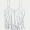 Spetsdetaljerad peplum-top