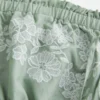 Strapeless broderad babydollklänning Strapeless broderad babydollklänning