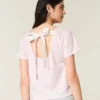 T-shirt med blommönster och enkel rosettknut