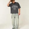 Tjock baggy crop-fotbollströja med Detroit-tryck