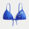 Triangelbikinitopp med pärlor över axlarna