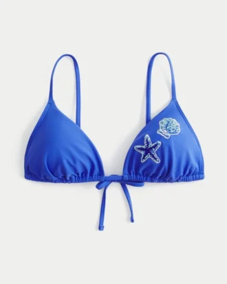 Triangelbikinitopp med pärlor över axlarna
