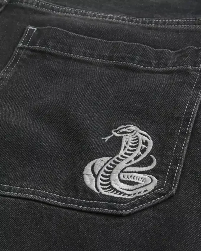Tvättade svarta baggy jeans med ormmotiv Tvättade svarta baggy jeans med ormmotiv