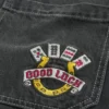Tvättade svarta Good Luck-broderade skaterbaggyjeans Tvättade svarta Good Luck-broderade skaterbaggyjeans
