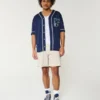 Twill-shorts som slutar ovanför knäet