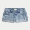 Ultra låg midja broderade denimminishorts