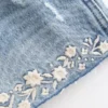Ultra låg midja broderade denimminishorts