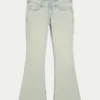Ultra låg midja, ljus tvätt, utsvängda jeans
