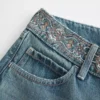 Ultra låg midja, medium tvätt, broderad midja, baggy jeans Ultra låg midja, medium tvätt, broderad midja, baggy jeans