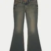 Ultra låg midja, mörk tvätt, utsvängda jeans Ultra låg midja, mörk tvätt, utsvängda jeans